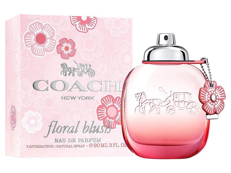 Coach Love Perfume red bottle with gold details and heart-shaped charm